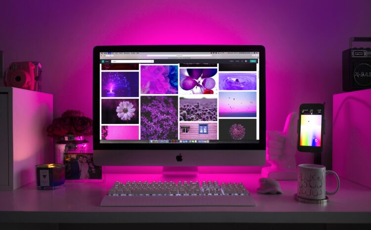 silver imac displaying collage photos 1779487